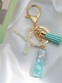 1 pièce Porte-clés avec lettre initiale, pendentif bicolore en résine, porte-clés minimaliste à la mode avec faux perle. Accessoire pour voiture, sac, sac à dos pour l'école, accessoires gothiques Y2K, idées de cadeaux pour la Fête des enseignants, Noël, accessoires pour sœur - Lac Bleu - Voir 12