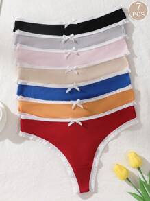 Set de 7 piezas/paquete de bragas tipo tanga con acentos de moño y textura acanalada para mujer, suaves y cómodas, de colores contrastantes, adecuadas para todas las estaciones