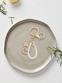 Advanced Texture Rhinestone Studded Winged Three-Dimensional Decoration,Advanced Elegant Golden Pearl Letter Keychain, Letters A-Z Three-Dimensional Pendant, Elegant Pearl Chain Flash Diamond (Removable According To Personal Preference) Fashion Alloy Keychain Ring, Earphone Pendant, Backpack Charm Car Keychain - Multicolor - View 5