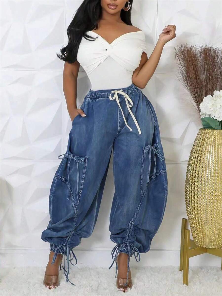 GLOURI Women's Baggy Denim Harem Pants - Elastic Drawstring Waist Wide Leg Jeans With Bow Tie & Pockets | Casual Boho Streetwear For Travel/Everday Comfort (Vintage Distressed Wash) - Màu xanh lam - Xem 1