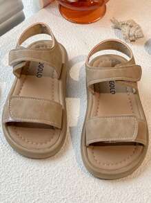 A Pair Of Summer Bestselling Children's Non-Slip Sandals. The Upper Is Khaki Color, With Double Hook And Loop Strap Design, Easy To Slip On And Off And Adjust The Tightness. The Overall Style Is Simple And Casual, Suitable For 3-12 Years Old Children In Daily Travel, Play And Other Occasions To Wear, Comfortable And Practical.Hook And Loop