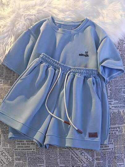 Conjunto esportivo casual de 2 peças, camisa e shorts de manga curta com ajuste solto de verão, decoração bordada