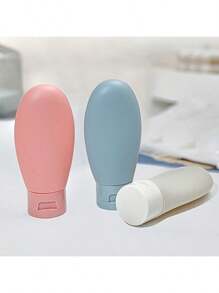 Conjunto de 3 frascos de viagem, recipientes recarregáveis de silicone à prova de vazamento, espremíveis para xampu, condicionador e loção - Recipientes cosméticos de 2,03 onças aprovados pela TSA, feitos sem materiais que contenham álcool.