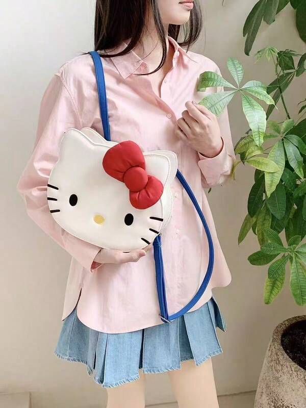 Sanrio La bolsa de mano de 1 pieza con diseño Hello Kitty, con una variedad de opciones y estilos, es perfecta para viajar, tomar fotos, y hacer un regalo ideal para vacaciones y entre amigos