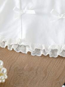 Mädchen Spitzen gesäumtes ärmelloses Top mit Schleife + gestreifte schwarz-weiße ausgestellte Hose Sommeroutfit