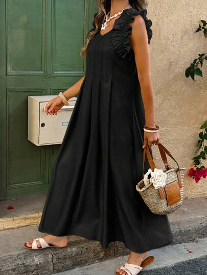 Vestito da donna con maniche a volant, vita svasata e pieghe