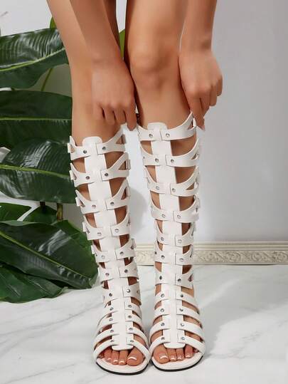 1 par de sandalias planas de talla grande para mujer, de unicolor, con diseño de moda punk vanguardista, casuales, de fiesta, calle, de PU, caladas, con remaches, cremallera y diseño romano de gladiador, para fiestas, al aire libre y verano