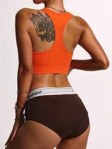 Brassière de sport à dos nageur sans couture orange mandarine - Top d'entraînement léger et respirant avec support léger. Avec tailles UE/ME/CA (Tarification intelligente des taxes + Livraison gratuite) - Orange - Voir 2