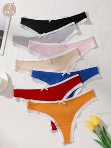 Set de 7 piezas/paquete de bragas tipo tanga con acentos de moño y textura acanalada para mujer, suaves y cómodas, de colores contrastantes, adecuadas para todas las estaciones