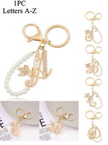 Advanced Texture Rhinestone Studded Winged Three-Dimensional Decoration,Advanced Elegant Golden Pearl Letter Keychain, Letters A-Z Three-Dimensional Pendant, Elegant Pearl Chain Flash Diamond (Removable According To Personal Preference) Fashion Alloy Keychain Ring, Earphone Pendant, Backpack Charm Car Keychain - Multicolor - View 1