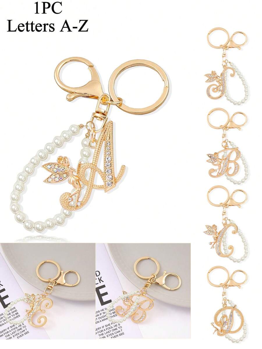 Advanced Texture Rhinestone Studded Winged Three-Dimensional Decoration,Advanced Elegant Golden Pearl Letter Keychain, Letters A-Z Three-Dimensional Pendant, Elegant Pearl Chain Flash Diamond (Removable According To Personal Preference) Fashion Alloy Keychain Ring, Earphone Pendant, Backpack Charm Car Keychain - Multicolor - View 1