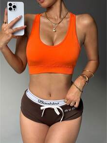 Brassière de sport à dos nageur sans couture orange mandarine - Top d'entraînement léger et respirant avec support léger. Avec tailles UE/ME/CA (Tarification intelligente des taxes + Livraison gratuite) - Orange - Voir 5