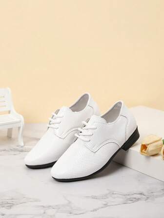 儿童英式牛津鞋，新款春秋时尚尖头亮黑色透气男童牛津鞋，返校