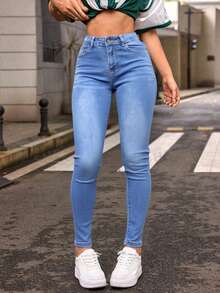 Pantalones jeans ajustados de cintura alta en azul claro, tela suave y elástica, ideales para estilos casuales y versátiles - Lavado ligero - Ver 4