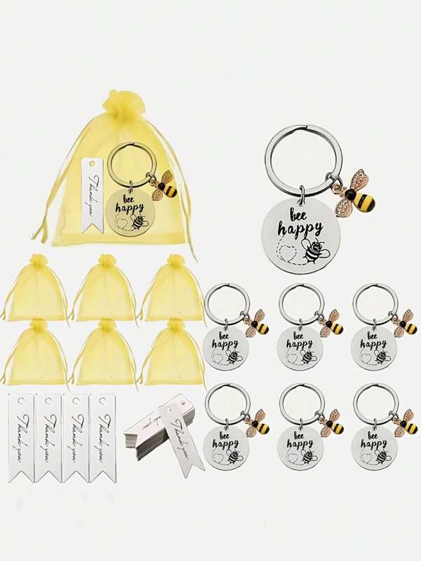 Set van 24/12 sleutelhangers met de tekst Bee Happy Charmed - ovaalvormige, inspirerende quote-tokens van roestvrij staal met splitring, geleverd in gele organzazakjes. Bedankcadeaus. Perfecte universele cadeaus voor de Dag van de Leraar, afstuderen, afscheidsfeestjes en bruiloften.
