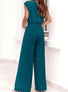 Ensemble deux pièces grande taille avec Top court à col en V et taille nouée, avec pantalon large. Décontracté et ajusté, parfait pour le printemps/été et le port quotidien