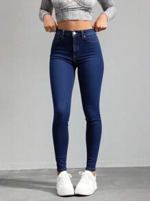 Jeans ajustados de cintura alta en azul marino, tela suave y elástica, ideal para estilos casuales y versátiles