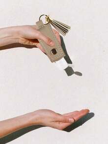 1 pezzo Custodia in pelle porta flaconcino igienizzante, bottiglia di viaggio ricaricabile vuota da 30ml per sapone, lozione e liquidi, con tappo a scatto, porta flaconcino portatile per zaino, viaggio, esterno, idea regalo di Natale