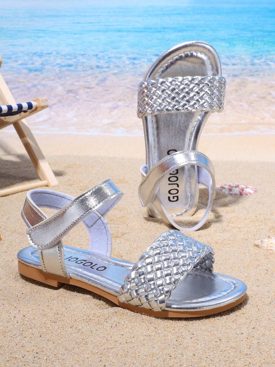 Ein Paar Kinder-Sommerschuhe aus Geflecht, geeignet für Jungen und Mädchen, flache Sandalen für Strand, Zuhause und Reisen, ein Stil den alle Kinder mögen