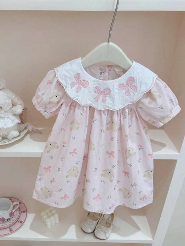 Vestido elegante para meninas com gola redonda bordada e laço, estampa de coelho e floral, estilo moderno, adequado para atividades ao ar livre, festivais, festas, primavera/verão