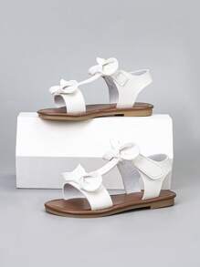 1 par de sandalias planas con abertura en los dedos y lazos para niñas, apropiadas para uso en exteriores y playa en verano
