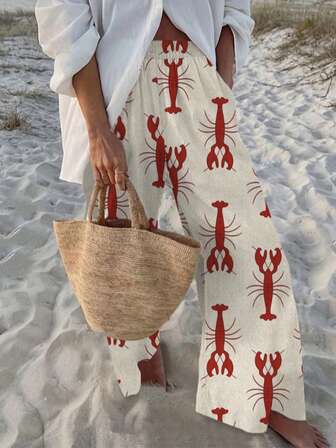 女士休闲花卉印花宽松梭织涤纶面料长裤，适合春夏季日常穿着和海滩穿着