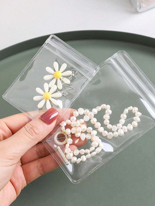 100pcs Antioxidant Jewelry Storage Bags, Resealable Jewelry Bags, Transparent PVC Ziplock Jewelry Bags, Jewelry Dustproof Sealing Bags, Ring And Earring Storage Bags, Small And Convenient Jewelry Storage Bags, Portable And Space-Saving, Essential For Storing Earrings, Rings, Bracelets, Necklaces, Jewelry, Accessories, Travel Essentials, Gifts, Easter Gifts. Summer Storage Organizer Gift Back To School