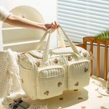 2025 Neuer koreanischer Reisebeutel für Mütter mit großer Kapazität, geeignet auch für Väter; Nützliches Design mit Mehrfachtaschen und funktionalen Fächern zur Aufbewahrung verschiedener Babyartikel; Reißverschluss-Klappe oben für einfachen Zugriff auf Kleidung und Artikel; verziert mit süßem Bären-Patch Dekor für zusätzlichen Spaß