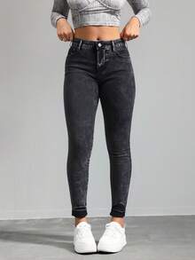 Jeans ajustados de cintura alta en gris oscuro, tela suave y elástica, ideal para estilos casuales y versátiles - Gris Oscuro - Ver 1