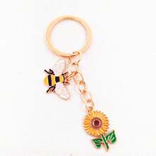 1pc Cartoon Sunflower And Bee Shaped Keychain Pendant For Women, Creative Oil Drip Zinc Alloy Key Ring, Backpack Ornament, Universal Car/Bag Decoration, For Friends Or Commemoration Present Car Accessories Bag Charm Backpack For School Letter Cute Goth Y2k Halloween Accessories Teachers Day Christmas Gift Ideas Bag Lanyards With Id Holder Car Accessories Bag Charms