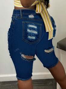 Pantalones cortos de mezclilla con dobladillo crudo desgarrado