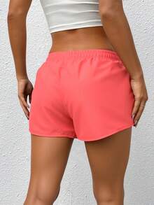 Short corto deportivo sport fitness ejercicio dama mujer pretina elástica jareta dos bolsillos calor primavera verano ideal correr caminar playa día noche jardín parque playa cómodo - Naranja - Ver 2