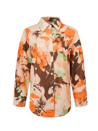 女士时尚印花纽扣领衬衫，修身版型，适合春、夏、秋季穿着。