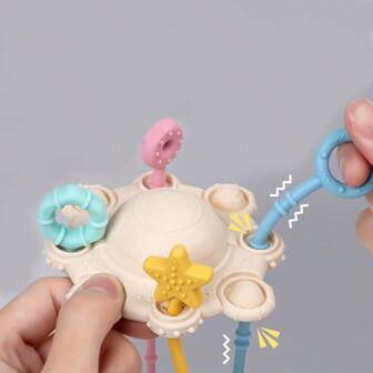 1 件蒙特梭利玩具，适合 18 个月以上的婴儿 - 婴儿感官玩具，适合男孩和女孩 - 幼儿硅胶拉绳活动玩具 - 锻炼宝宝的活动能力 - 玩具发出独特的声音来吸引宝宝的注意力 - 最佳婴儿生日礼物