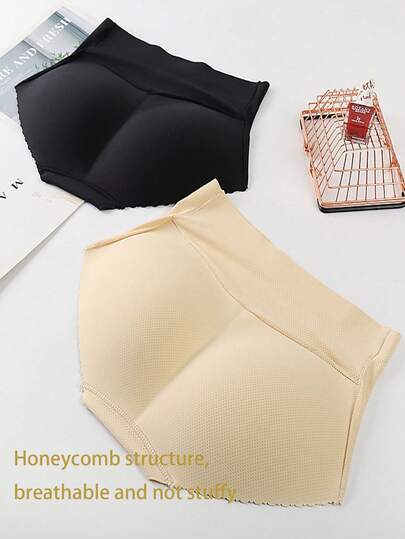 这款女士中腰提臀塑形内裤采用透气低腰设计，具有收腹功能和仿臀设计，可提升臀部线条。它是一款带衬垫的提臀塑形内裤，能够打造蜜桃臀型。内衬无衬垫，穿着舒适贴身，如同普通内裤。