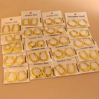 24 Random Styles Of Golden Stainless Steel U-Shaped, Heart-Shaped, And Round Oil Pressure Earrings.