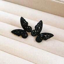 1 par de elegantes y sensuales pendientes de mariposa negra de lujo, adecuados para banquetes, uso diario, vacaciones y fiestas de mujeres