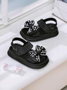 一双夏季时尚百搭的儿童凉鞋，饰有可爱的蝴蝶结，轻便透气，易于穿脱，适合女孩户外穿着以及日常海滩休闲活动。 - 黑色 - 查看 3