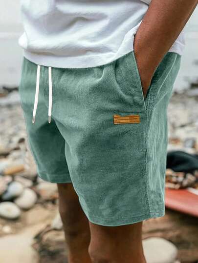 宽松绿色灯芯绒直筒短裤，男士印花街头风格休闲夏季运动短裤