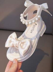 1 paio di sandali piatti con finta perla, fiocco di nastro, chiusura a gancio e anello regolabile, alto, antiscivolo, colore bianco, per bambini
