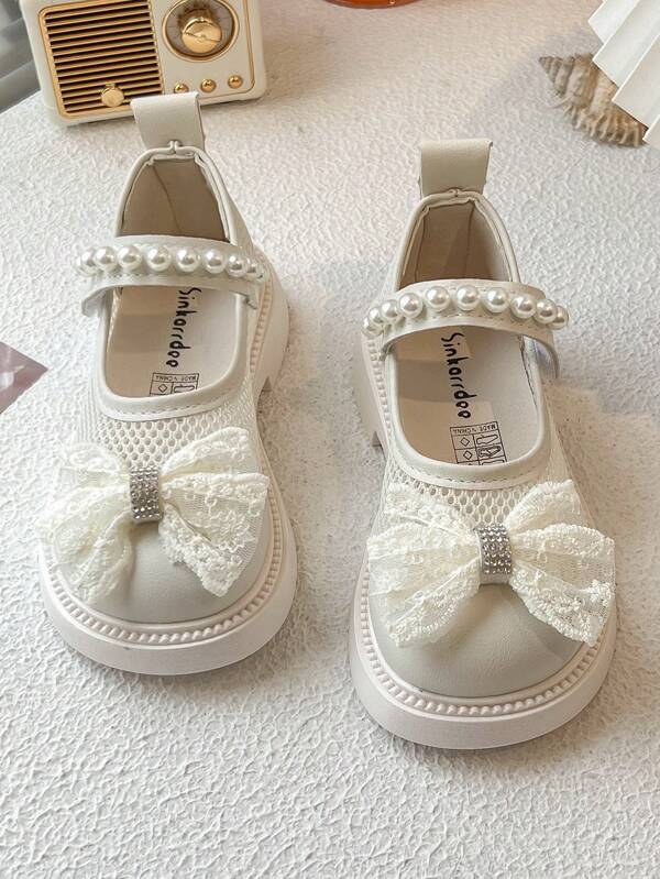 Girls' Hollow Leather Shoes 2025 Spring/Summer Bow Cute Shoes Children's Preppy Casual Shoes Girls' Shoes Simple Bow Beige Princess Moccasins