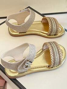 A Pair Of Summer Bestselling Children's Non-Slip Sandals. The Upper Is Mainly Gold, With Braided Ribbon Design, With Shiny Decorative Bands, Ankle Buckles And Fine Metal Decoration - Gold - View 5