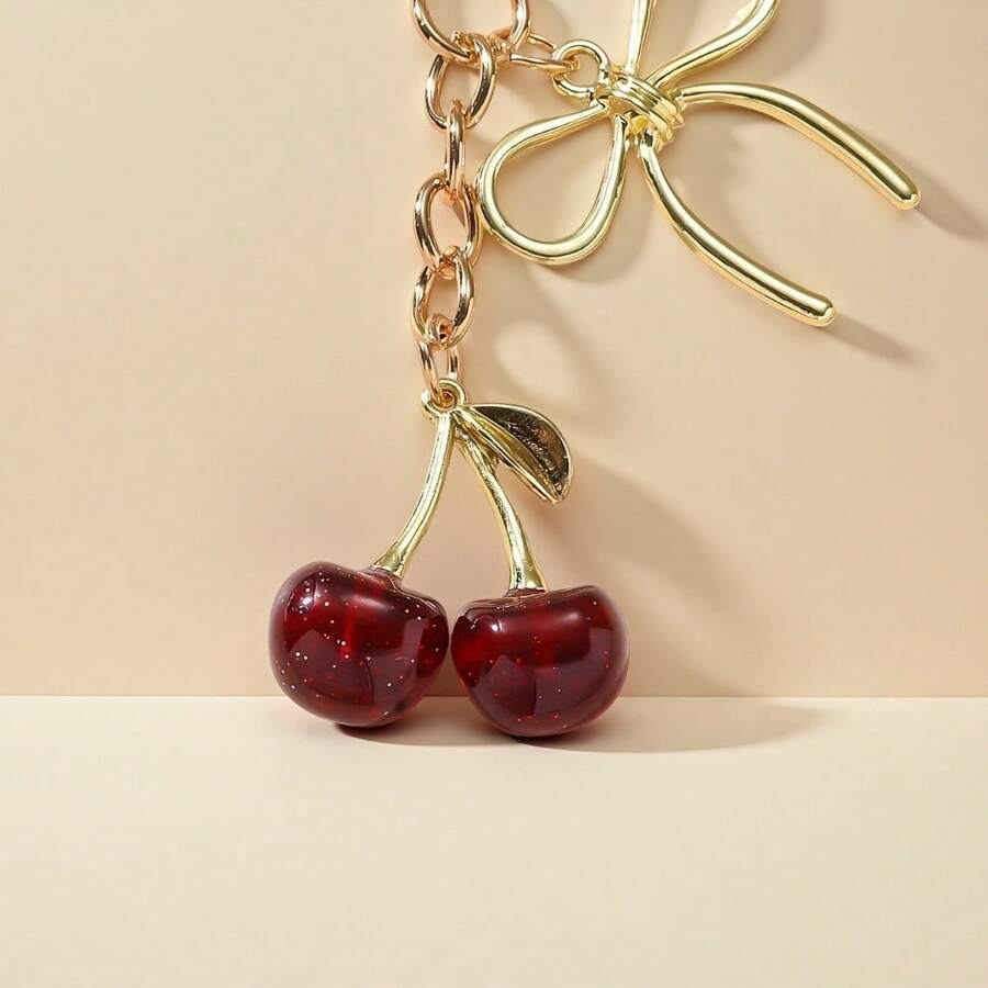 1 pieza Nuevo llavero de mujer con lazo de cereza de metal, accesorio de lazo de moda, colgante minimalista de estilo Ins para bolsa, regalo de vuelta al colegio