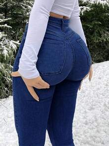 Pantalones vaqueros ajustados de mezclilla con corte de bota y dobladillo dividido, estilo casual azul lavado, cierre de botón con cremallera, para mujer. - Azul - Ver 1