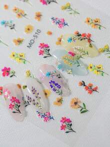 一套春夏花卉主题美甲贴纸，包含各种盛开的花朵、雏菊和带枝条的花卉图案，适合女性、女孩、家庭和个人DIY使用。 - 彩色 - 查看 6