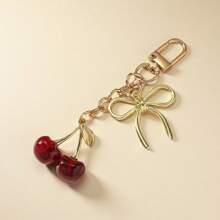 1 pieza Nuevo llavero de mujer con lazo de cereza de metal, accesorio de lazo de moda, colgante minimalista de estilo Ins para bolsa, regalo de vuelta al colegio