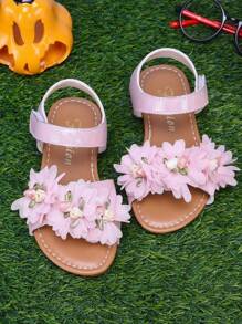 Sandalias de flores de verano 2025, sandalias de playa con suela suave, estilo princesa de dedo abierto, diseño lindo y de moda para niñas