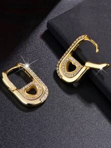 Elegantes pendientes de corazón hueco plateados en plata de ley 925 y oro de 14k, apropiados para que las mujeres los usen en conciertos y fiestas