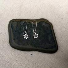 1 paire de boucles d'oreilles pendantes rétro minimalistes vintage argentées en forme de marguerite, bijoux élégants et à la mode pour femmes