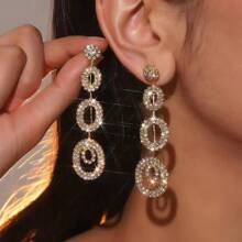 Par de pendientes con colgantes de cristal, elegantes y sensuales, para uso en discoteca, para mujeres